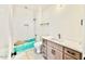 Clean bathroom with subway tile, a bathtub, and modern vanity at 3317 Hampton Rd, Raleigh, NC 27607