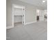 Spacious bedroom with neutral paint, carpet floors and views to closet, hallway and bathroom at 3317 Hampton Rd, Raleigh, NC 27607
