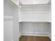 This closet features custom shelves and hanging racks for optimal storage at 3317 Hampton Rd, Raleigh, NC 27607