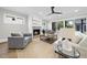 Cozy living room featuring a fireplace, neutral color palette, hardwood floors, and comfortable seating at 3317 Hampton Rd, Raleigh, NC 27607