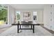Well-lit home office featuring hardwood flooring, windows, and neutral paint at 3317 Hampton Rd, Raleigh, NC 27607