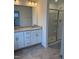Bathroom with double vanity, granite countertop, and large shower at 40 Shay St, Angier, NC 27501