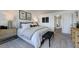 Main bedroom with plush bed, nightstands, and ample natural light at 40 Shay St, Angier, NC 27501