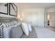 Main bedroom with double doors and a view into another room at 40 Shay St, Angier, NC 27501
