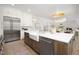 Spacious kitchen with white cabinetry, stainless steel appliances, and farmhouse sink at 4005 Brevard Pl, Raleigh, NC 27609
