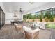 Covered patio with outdoor kitchen and ample seating at 4005 Brevard Pl, Raleigh, NC 27609