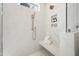 Bright shower featuring marble floors, shower seat and chrome fixtures at 4005 Brevard Pl, Raleigh, NC 27609
