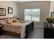 Bedroom with a queen-sized bed and large window at 41 Faircox Way # 137, Garner, NC 27529