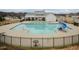 Community pool with slide and surrounding fence at 41 Faircox Way # 137, Garner, NC 27529