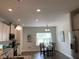 Bright dining area with hardwood floors and a table for four at 41 Faircox Way # 137, Garner, NC 27529