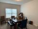 Dining room with a large table and bench seating at 41 Faircox Way # 137, Garner, NC 27529