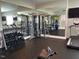 Community fitness center with various equipment and mirrors at 41 Faircox Way # 137, Garner, NC 27529