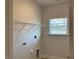 Laundry room with built-in shelving at 41 Faircox Way # 137, Garner, NC 27529