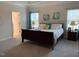 Spacious main bedroom with a large bed and en-suite bathroom at 41 Faircox Way # 137, Garner, NC 27529