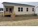 House exterior showcasing a deck and fenced backyard at 507 Barnes Landing Dr, Four Oaks, NC 27524
