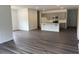 Open concept kitchen with island and gray cabinets at 507 Barnes Landing Dr, Four Oaks, NC 27524