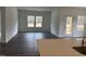 Living room with hardwood floors and access to a deck at 507 Barnes Landing Dr, Four Oaks, NC 27524