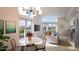 Open concept living room with dining area and city views at 507 Yancey St # 303, Durham, NC 27701