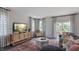 Relaxing living room with comfortable seating and a large TV at 701 Lucky Clover Way, Fuquay Varina, NC 27526