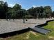 Community playground with swings and climbing structures at 701 Lucky Clover Way, Fuquay Varina, NC 27526