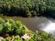 Lakefront home with dock, nestled in nature at 10305 Old Creedmoor Rd, Raleigh, NC 27613