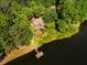 Lakefront home with private dock, aerial view at 10305 Old Creedmoor Rd, Raleigh, NC 27613