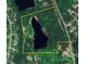 Aerial view showing property lines and lakefront home location at 10305 Old Creedmoor Rd, Raleigh, NC 27613