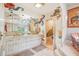 Elegant bathroom with double vanity, walk-in shower, and artistic wall decor at 10305 Old Creedmoor Rd, Raleigh, NC 27613