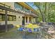 Deck with multiple seating areas, ideal for entertaining guests at 10305 Old Creedmoor Rd, Raleigh, NC 27613