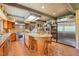Gourmet kitchen boasts stainless steel appliances and a large island at 10305 Old Creedmoor Rd, Raleigh, NC 27613