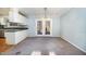 Dining room featuring a chandelier and access to the rear yard at 1109 Mays Chapel Rd, Bear Creek, NC 27207