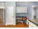 Kitchen featuring an office nook area and stainless steel appliances at 1109 Mays Chapel Rd, Bear Creek, NC 27207