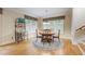 Charming breakfast nook with hardwood floors and a round dining table at 1300 Caistor Ln, Raleigh, NC 27614