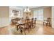 Elegant dining room with hardwood floors, chandelier, and custom cabinetry at 1300 Caistor Ln, Raleigh, NC 27614