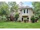 Brick house with a large backyard and deck at 1300 Caistor Ln, Raleigh, NC 27614