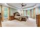 Spacious main bedroom with high ceilings and large windows at 1300 Caistor Ln, Raleigh, NC 27614