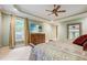 Main bedroom with plush carpet and large TV at 1300 Caistor Ln, Raleigh, NC 27614