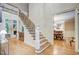 Open staircase with wrought iron railing at 1300 Caistor Ln, Raleigh, NC 27614