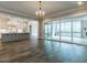 Spacious living area with hardwood floors, fireplace and sliding doors to patio at 131 Evander Way, Pittsboro, NC 27312