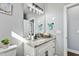 Bathroom with single sink, granite countertop, and decorative mirror at 137 Glenwood Pl, Kenly, NC 27542