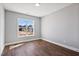 Bright bedroom with large window and hardwood floors at 137 Glenwood Pl, Kenly, NC 27542
