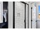 Modern shower with white subway tile and black accents at 137 Glenwood Pl, Kenly, NC 27542