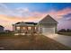 Charming single-Gathering home with a spacious front yard, covered porch and two car garage at 137 Glenwood Pl, Kenly, NC 27542