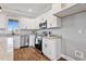 Well-lit kitchen area featuring stainless steel appliances, granite countertops, and ample cabinet space at 137 Glenwood Pl, Kenly, NC 27542