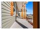 Inviting front porch with stylish seating, wooden pillars and lovely landscaping at 137 Glenwood Pl, Kenly, NC 27542