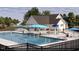 Resort-style pool with cabanas and a water feature at 182 Nimble Way # 220, Clayton, NC 27520
