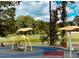 Community playground with swings and play area at 182 Nimble Way # 220, Clayton, NC 27520