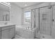 Bathroom with soaking tub, walk-in shower, and double vanity at 215 Ellsworth Manor Dr, Hillsborough, NC 27278