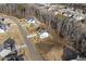 Overhead view of home with mature trees in a residential neighborhood, showcasing the property's prime location at 221 Old Hickory Dr, Raleigh, NC 27603
