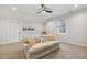 Bonus room with a ceiling fan, neutral carpet, and natural light from a window at 221 Old Hickory Dr, Raleigh, NC 27603